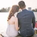 Couple sitting on the sea side-min