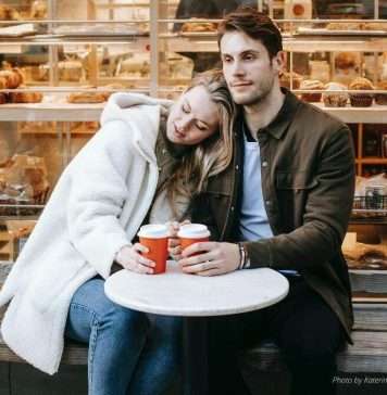 oung-couple-bonding-while-sitting-near-bakery