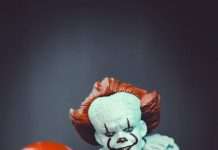 clown holding a red ball horror photo (1)